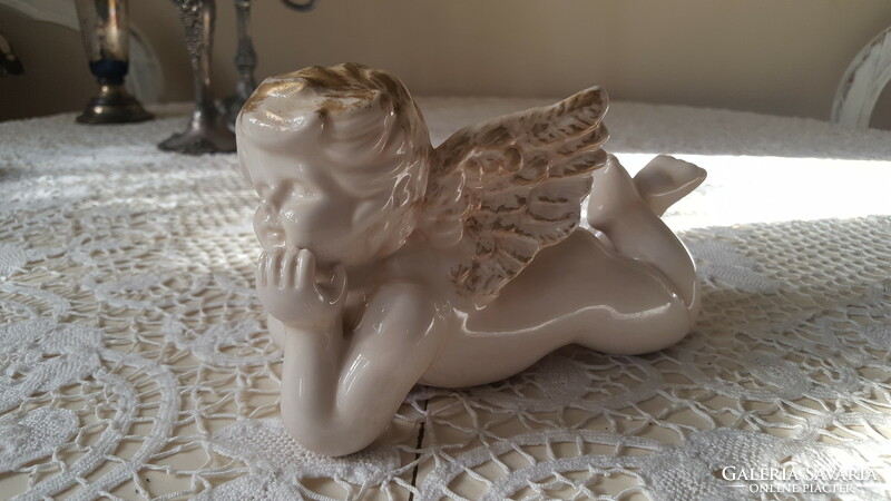 Súlyos aranyozott porcelán,fekvő angyalka 20 cm.
