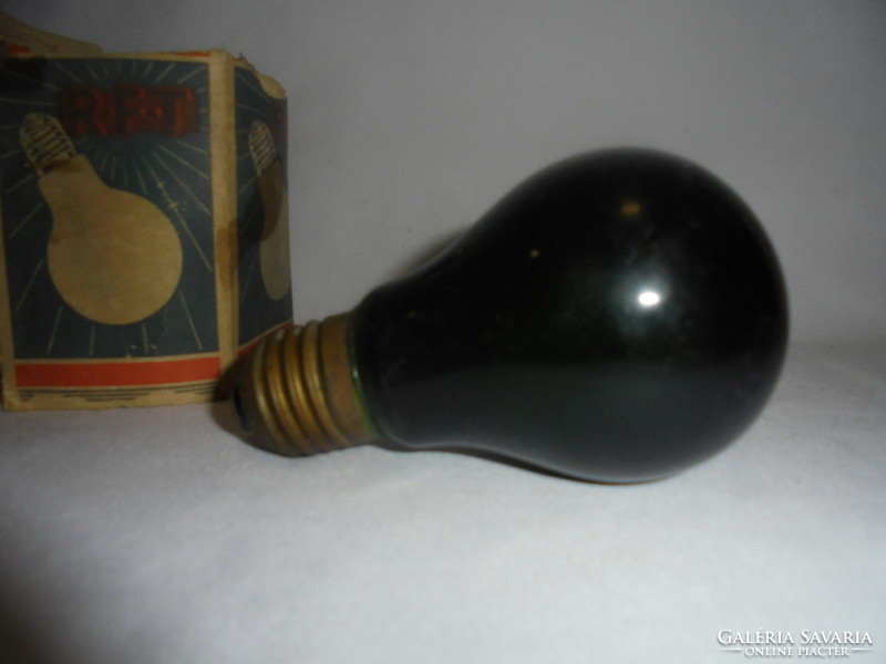 Old dark green light bulb in 