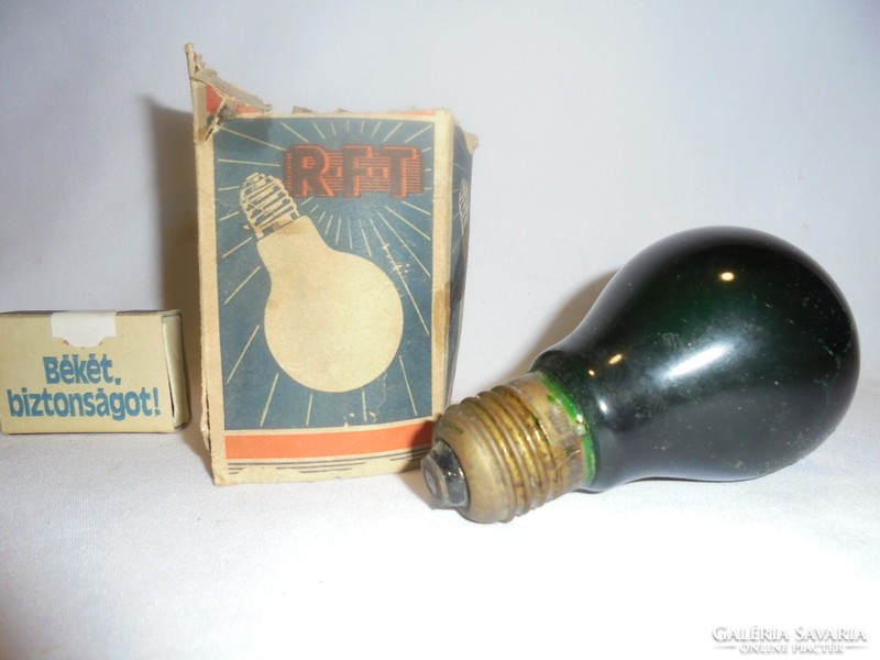 Old dark green light bulb in 