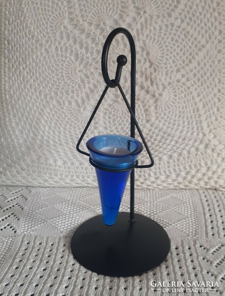 Blue glass candle holder on a black metal stand number 1