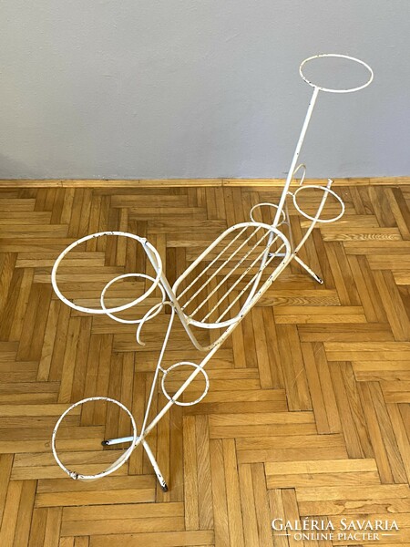 Art deco or bauhaus white colored antique wrought iron flower stand with an exciting shape