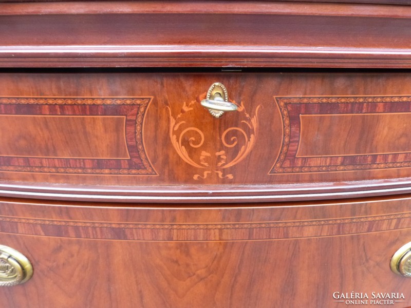 Inlaid chest of drawers.