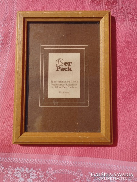 Wooden photo frame with glass plate