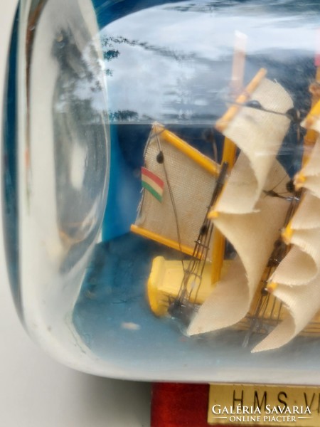 A sailboat built in a glass bottle