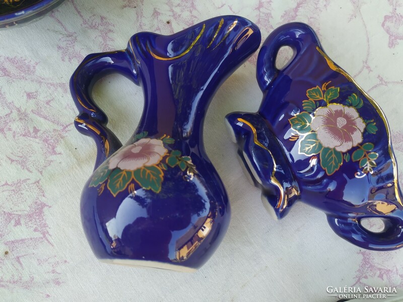 Porcelain, floral, jug, saucer for sale on a blue background!