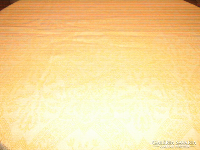 Wonderful baroque patterned woven tablecloth with fringed edges