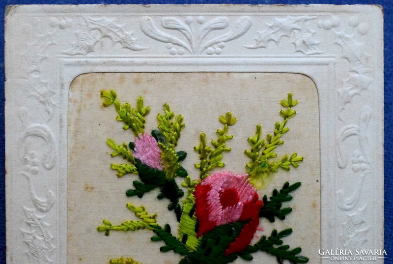 Antique greeting card in an embossed frame with hand-embroidered silk flowers