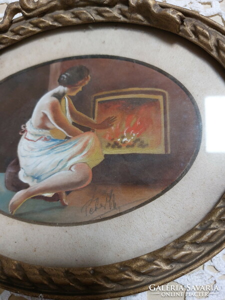 Painting: a female figure warming herself by a fireplace