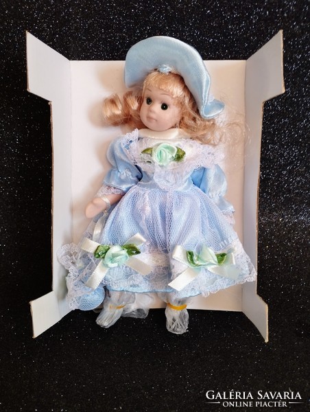 New boxed porcelain doll