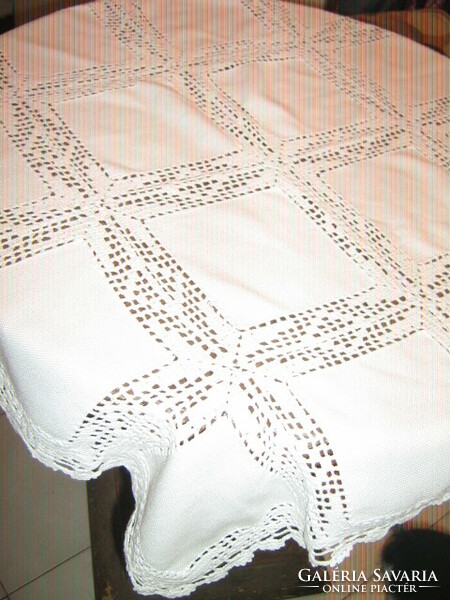 Beautiful handmade crocheted tablecloth with round inserts