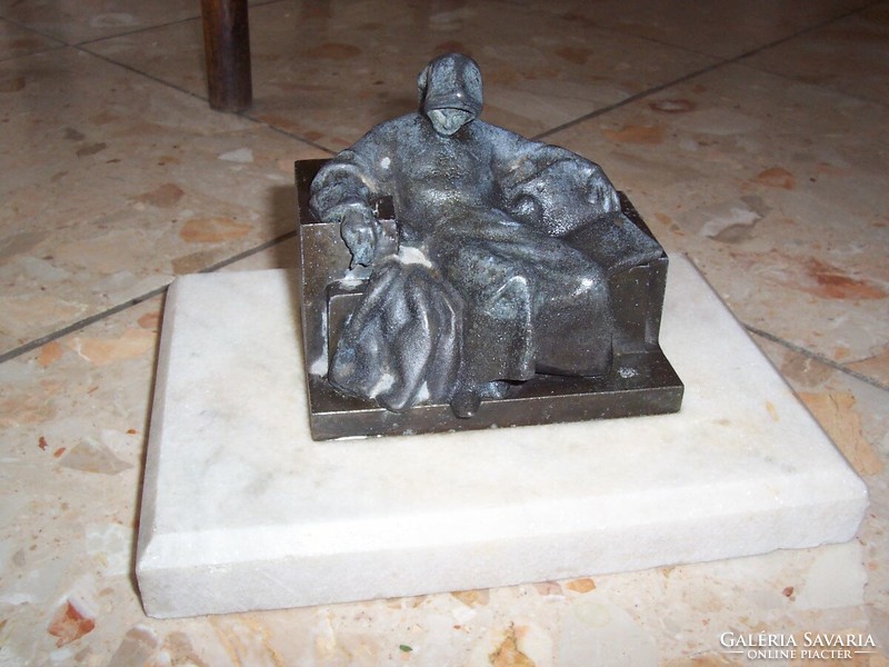 Anonymous statue on marble pedestal