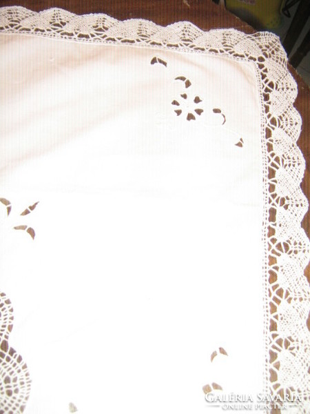 Beautiful white lace tablecloth with lacy edges and embroidered embroidered rice