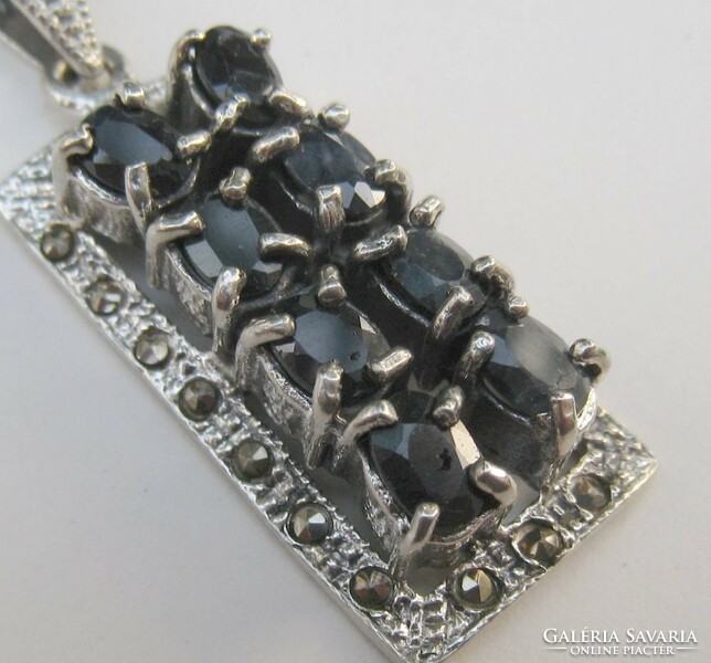 Silver pendant with many natural sapphires