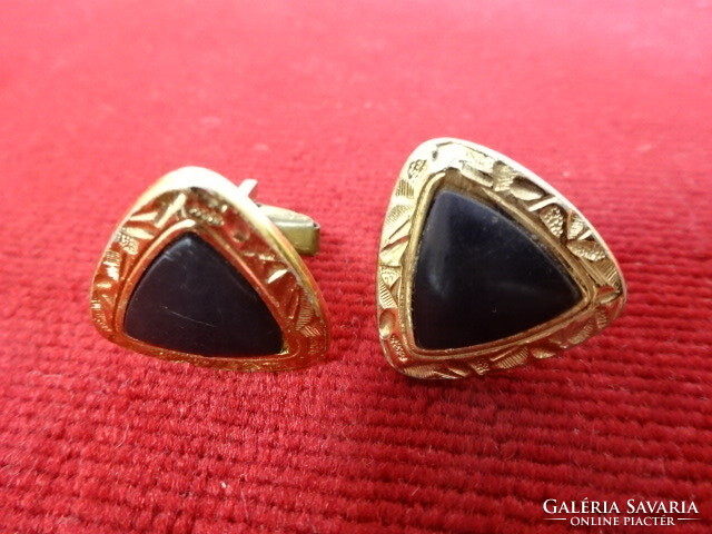 Gold-plated cuff links decorated with a black triangle. Jokai.