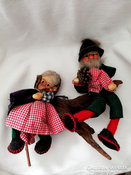 Handmade puppets of stepmother and stepmother resting on a tree branch, room decorations, decorations