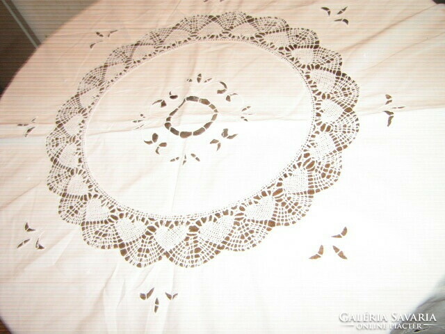 Beautiful white lace tablecloth with lacy edges and embroidered embroidered rice