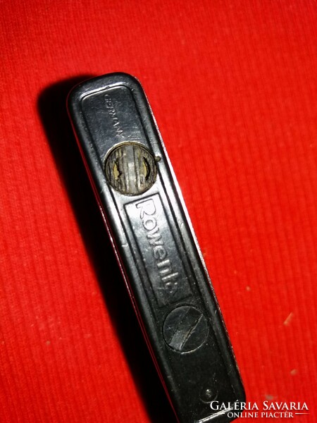 Old metal German metal Rowenta petrol lighter as shown in the pictures
