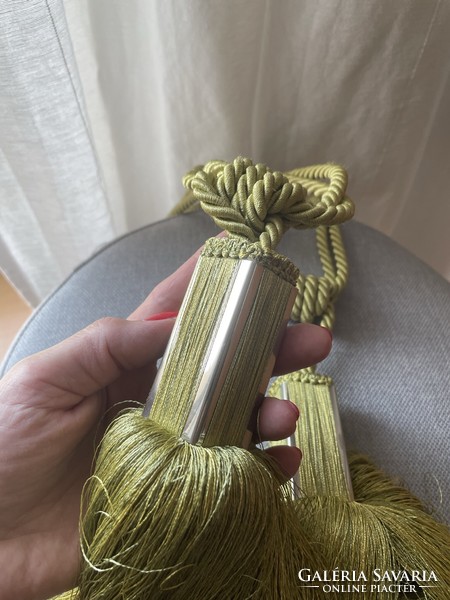 Large green curtain ports, tassels in pairs