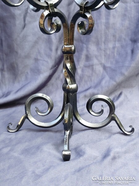 Wrought iron candle holder with 5 branches.