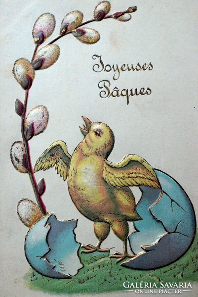 Antique embossed Easter greeting card chick hatching from an egg