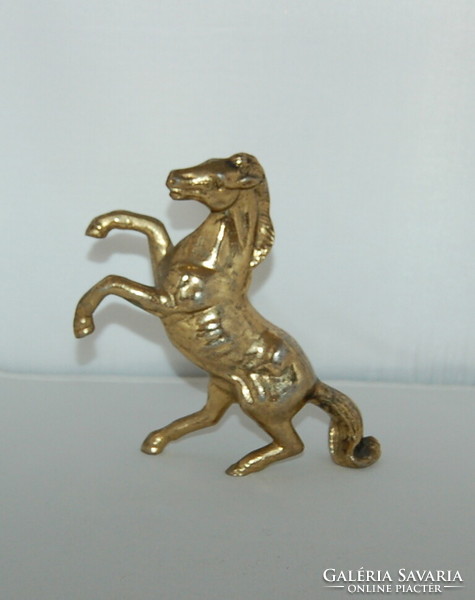 Copper statue of a climbing horse