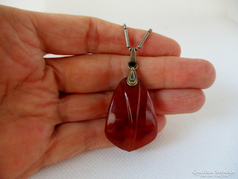 Beautiful antique Russian carved amber silver pendant on a long silver necklace