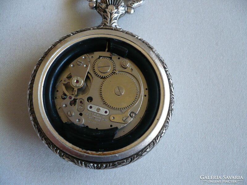 Santus is a beautifully decorated and very rare Swiss mechanical pocket watch with a hunting scene