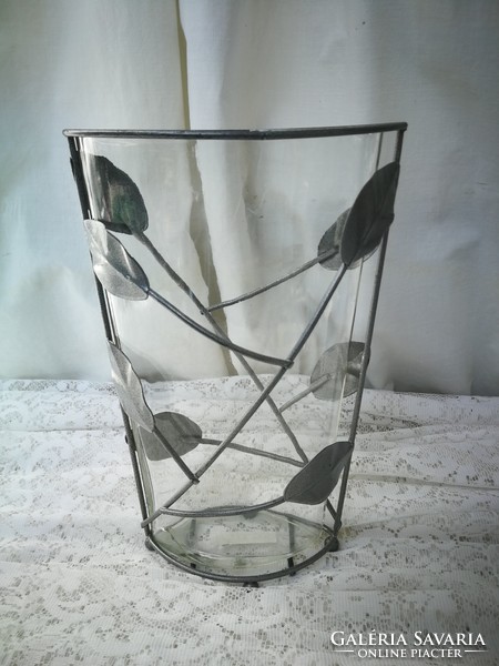 Glass vase with metal decoration