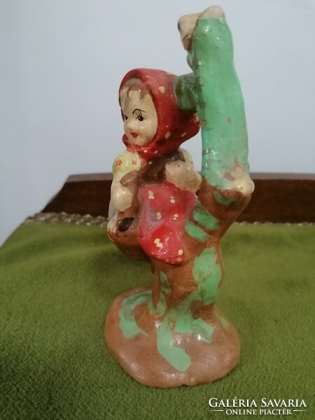 Old ceramic little girl with polka dot headscarf