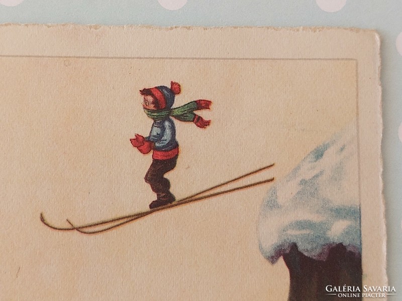 Régi karácsonyi képeslap levelezőlap síelő fiú