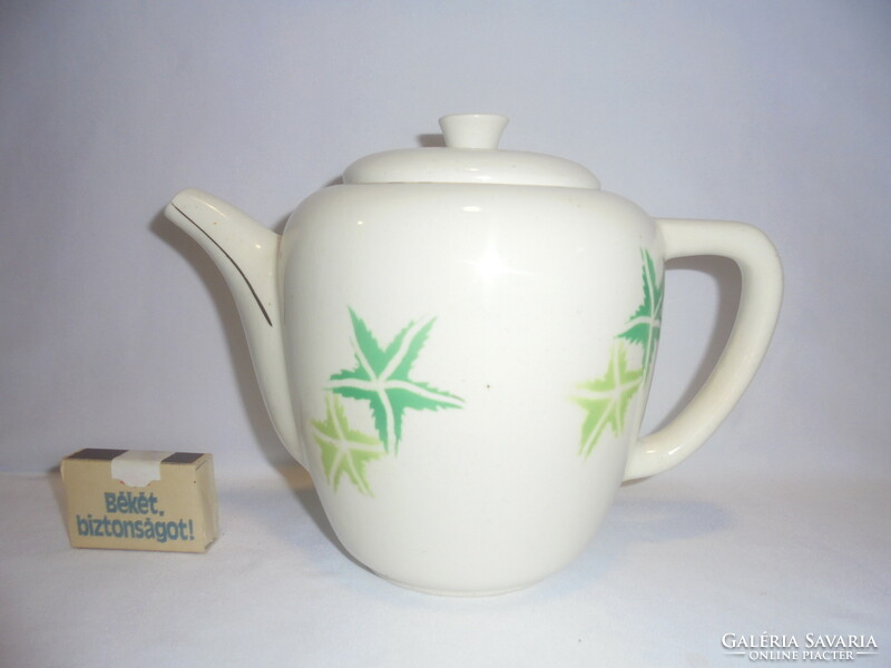 Old granite tea spout, tea pot