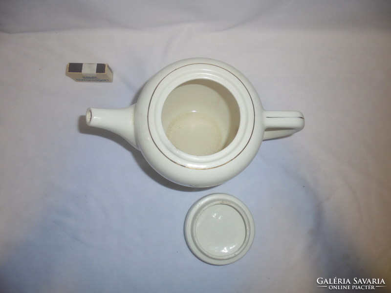 Old granite tea spout, tea pot