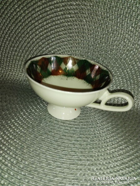 Porcelain tea cup.