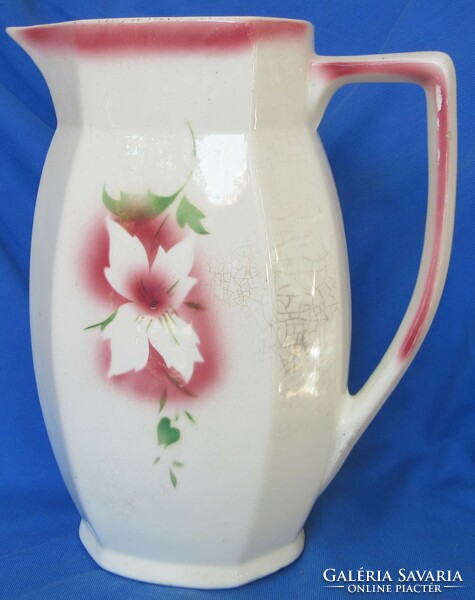 Old granite jug with flower pattern, marked 26 cm high