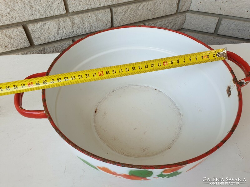 Old enameled bowl with a crown crest and rose pattern