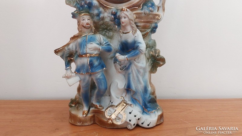 (K) beautiful porcelain statue with clock