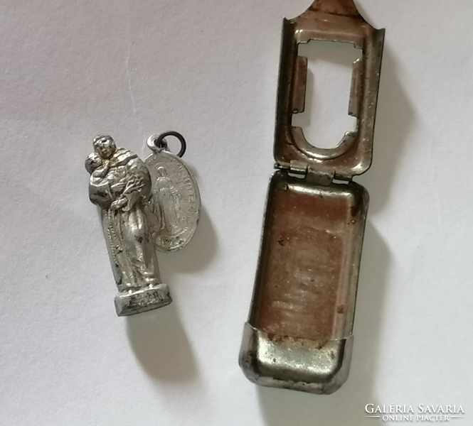 Old amulet holder, inside a pendant and a miniature statue of St. Antal 315.
