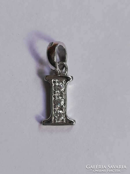 Silver pendant with the letter i