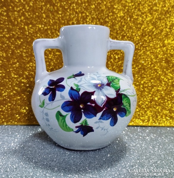 Small ceramic vase with flower pattern