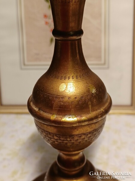Old brass candle holder with a nice pattern