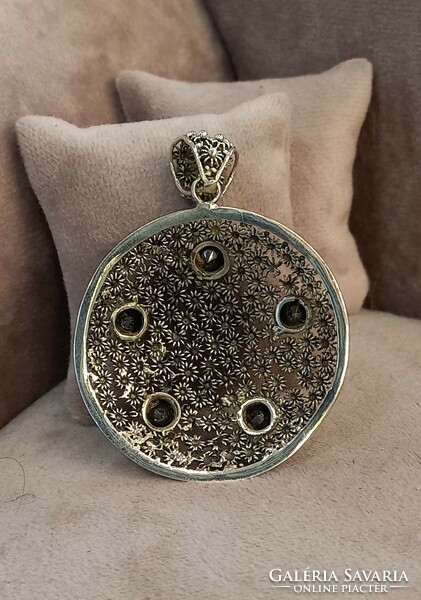 Indonesian filigree silver pendant with onyx stones
