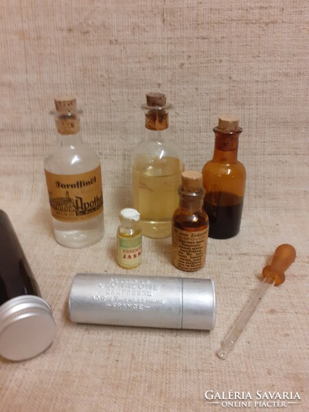 Old metal and other medicine bottles boxes with dropper in one