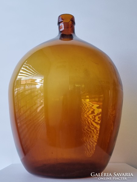 Old large amber colored glass balloon