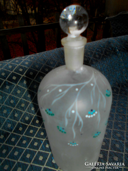 Painted perfume bottle is a beautiful piece of craftsmanship