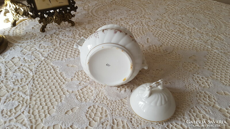 Beautiful antique sugar bowl with floral lid