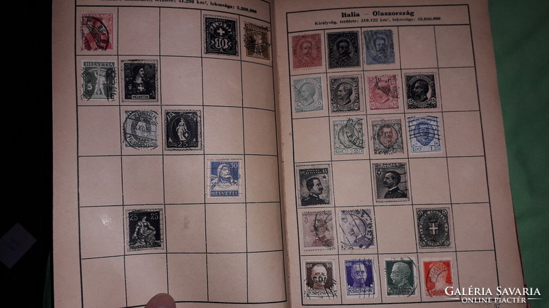 Antique Tolna stamp album book for use by beginner stamp collectors, with many stamps as shown in the pictures
