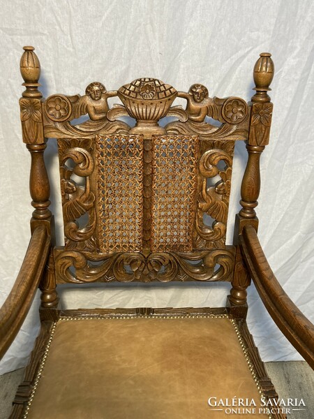 Throne chair with leather seat.