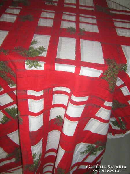 A large tablecloth with a beautiful Christmas pattern