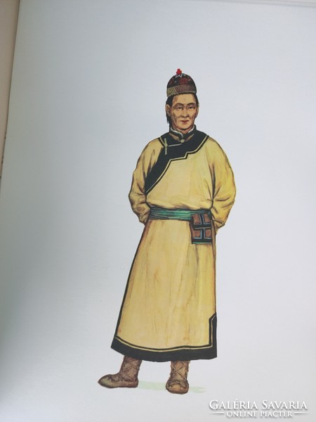 A book showing drawings of Russian folk costumes - not Hungarian