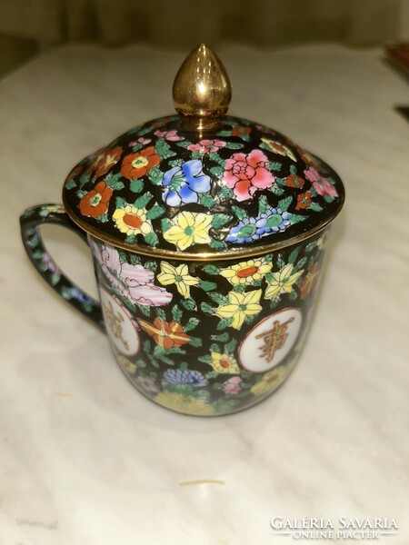 Hand-painted, lidded, gilded tea cup